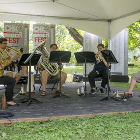 A quintet of brass musicians performs at Chamberfest 2018 on the grounds of Rideau Hall.