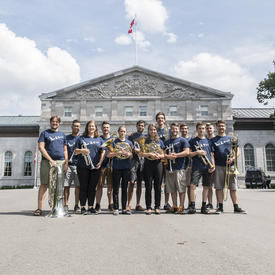 A group photo of the musicians who performed at Chamberfest 2018, standing in front of Rideau Hall.