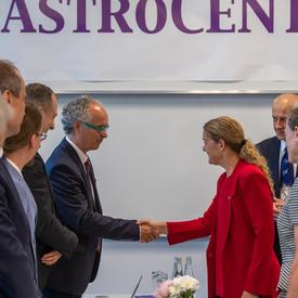 The Governor General shakes hands with a committee member at AstroCeNT.