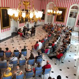 Quatuor Andara performs for a crowd inside the tent room, at Rideau Hall, for Chamberfest.