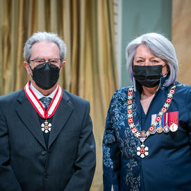 Lotfollah Shafai is standing next to the Governor General.