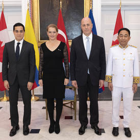 The three new heads of mission posed for a group photo with the Governor General. 