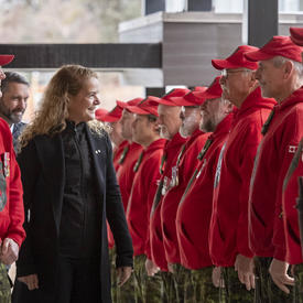 The Governor General, Julie Payette, inspects a row of Canadian Rangers. 
