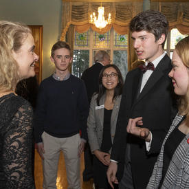 The Governor General spoke to students during the reception. 