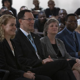 The Governor General and Canadian delegates Professor Neil Turok and Lisa Stadelbaue are listening to the discussion. 