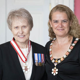 Roberta Lynn Bondar and the Governor General pose for a photo.