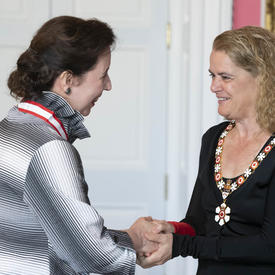 Angela Hewitt shakes hands with the Governor General.