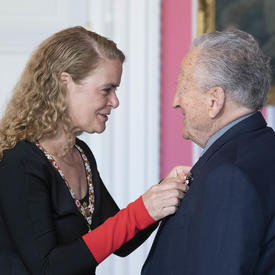  Eli Bornstein accepts his medal from the Governor General.
