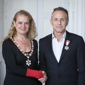 Arthur Fogel shakes hands with the Governor General.