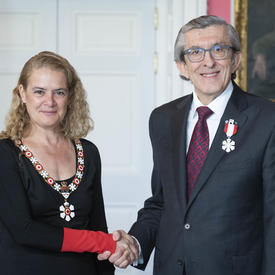  K. Wayne Johnston shakes hands with the Governor General.