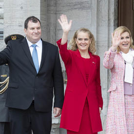 Mr. Jakov Kitarović, the Governor General and the President of the Republic of Croatia wave goodbye to members of the public who attend the welcoming ceremony. 