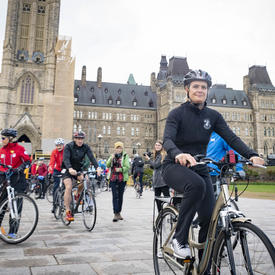 The Governor General riding her bike at Parliament Hill.
