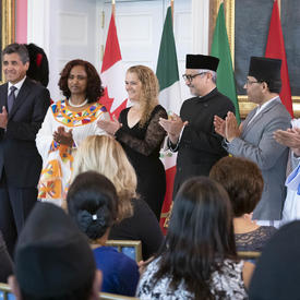 The five new heads of mission are posing for a group picture with the Governor General. 