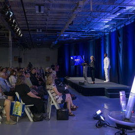 The Governor General delivers remarks at a podium.