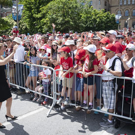 The Governor General waved to people as she made her way to Parliament Hill. 