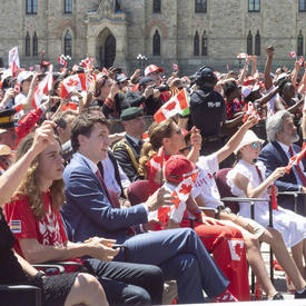 The Governor General and the Prime Minister watched the show while waving Canadian flags. 