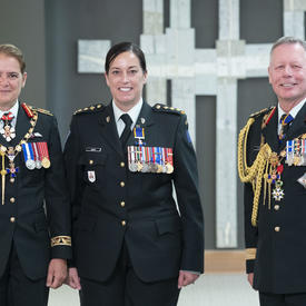Captain Maryse Yolande Nancy Guay poses for a photo with the Governor General and the Chief of the Defence Staff.