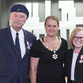 Barbara Bowlby and John Brunton pose for a photo with the Governor General.