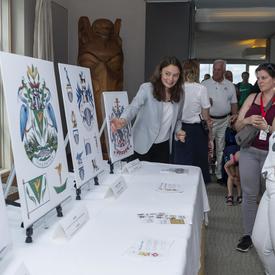 Rideau Hall staff showed visitors different crests. 
