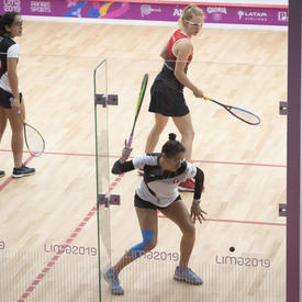 Canadian squash players Samantha Cornett and Danielle Letourneau played against Peru. 