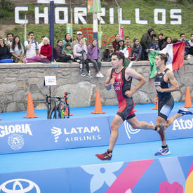 Canadian triathlete Charles Paquet is in the lead during a portion of the run. 