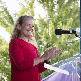 The Governor General is delivering a speech from a podium. 