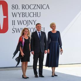The Governor General stands beside President Duda of Poland and the First Lady of Poland.