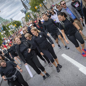 The Governor General with the crowd taking part in the GCWCC 5 km Walk Run Roll.