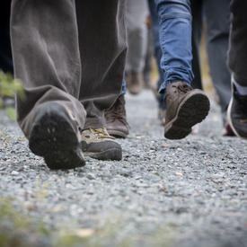 Feet of people walking. 