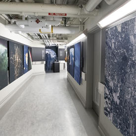 Display of photographs of Canadian provinces and territories taken by astronauts.