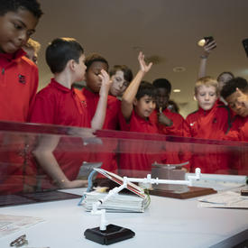 Students visit and view the Dare to Dream space exhibit at Rideau Hall. 