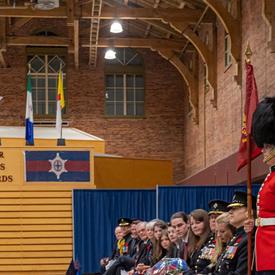 The Governor General salutes the Governor General's Foot Guards during a change of command ceremony.