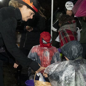 The Governor General greets trick-or-treaters.