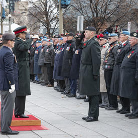 The Governor General faces and salutes veterans during the National Remembrance Day Ceremony. 