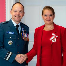 The Governor General shakes hands with Brigadier-General Pelletier. 