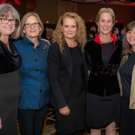 A photo of the Governor General with IWF members. 
