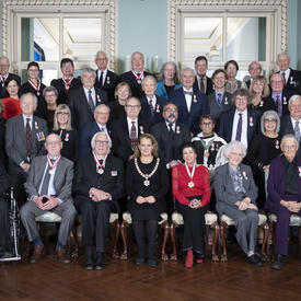 A group photo of the newly invested Order of Canada inductees.