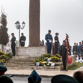 Members of the Canadian Forces stand sentry at the four corners of the Pontecorvo Monument.