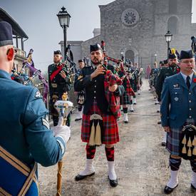 Canadian Armed Forces Pipes and Drums Band performing in Pontecorvo.