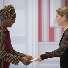 The Ambassador-designate of the Republic of Zimbabwe hands letters of credence to the Governor General.