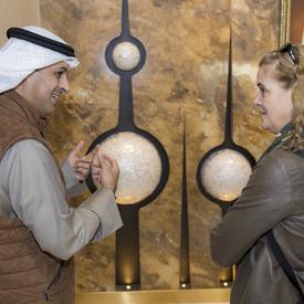 A guide gives the Governor General a tour of the Kuwait Towers. 