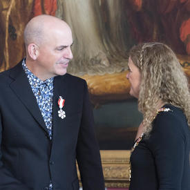 The Governor General speak with Robert Stephen Hogg. 