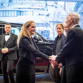 Upon arrival, the Governor General is welcomed to the National Arts Center. 