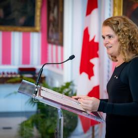 The Governor General delivering remarks from the podium. 