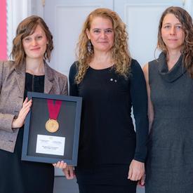 Representative from the Cumberland Museum and Archive pose for a photo with Governor General. 