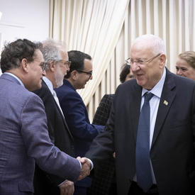 His Excellency Reuven Rivlin, President of the State of Israel shook hands with members of the Canadian delegation. 