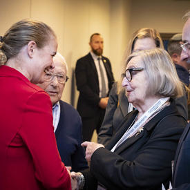 The Governor General chats with a Holocaust survivor. 