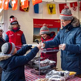 Many embassies offered delicious snacks and warm drinks to help keep visitors warm. The Embassy of Switzerland served raclette.