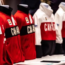 A photo of Canadian Olympic gear on mannequins. 