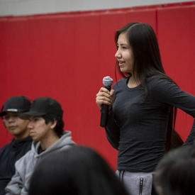 A student asks the Governor General a question during a question and answer session. 